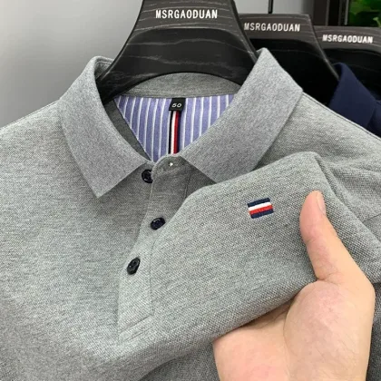 Summer 2024 New High end Embroidered Polo Collar Casual Men's Polo Shirt Short sleeved Solid Color Designer Men's Top T-shirt