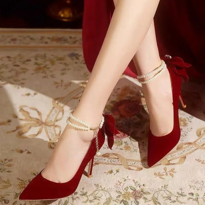 Red Xiuhe wedding shoes new pointy stiletto high heels female shallow mouth bow pearl one word buckle strap two wear bride shoes - Image 3